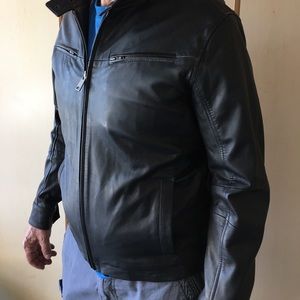 Men's leather Members Only jacket, medium.