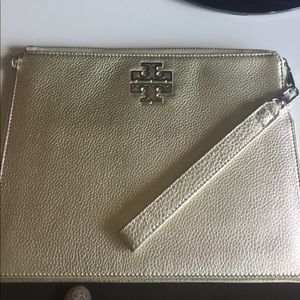 Tory Burch authentic clutch gold leather w strap