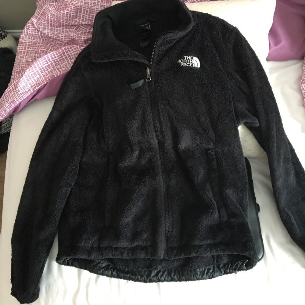 black fuzzy north face jacket
