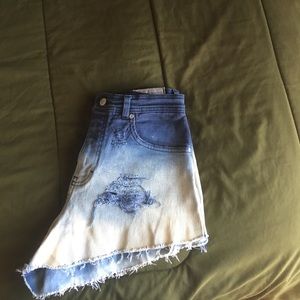 High waisted destroyed ombré shorts.