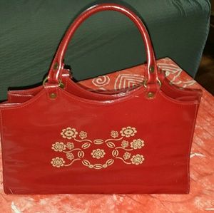 Red patent leather bag.