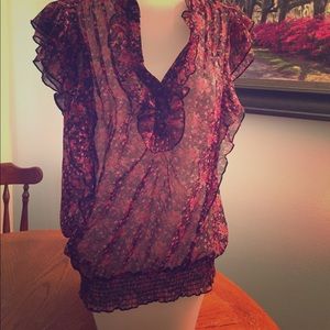 Sheer blouse with ruffled sleeves