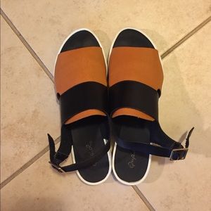 Brown and black faux leather sandals
