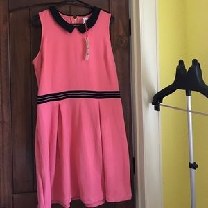 Sleeveless tea rose with black dress.
