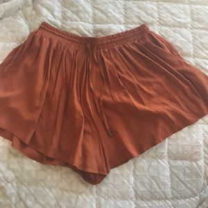 loose rust colored shorts