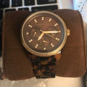 Micheal Kors tortoise shell watch lightly used