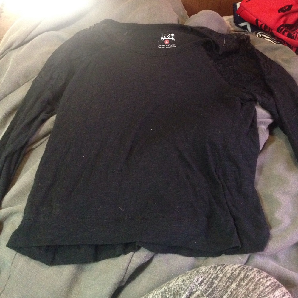 Black shirt with lace on shoulders