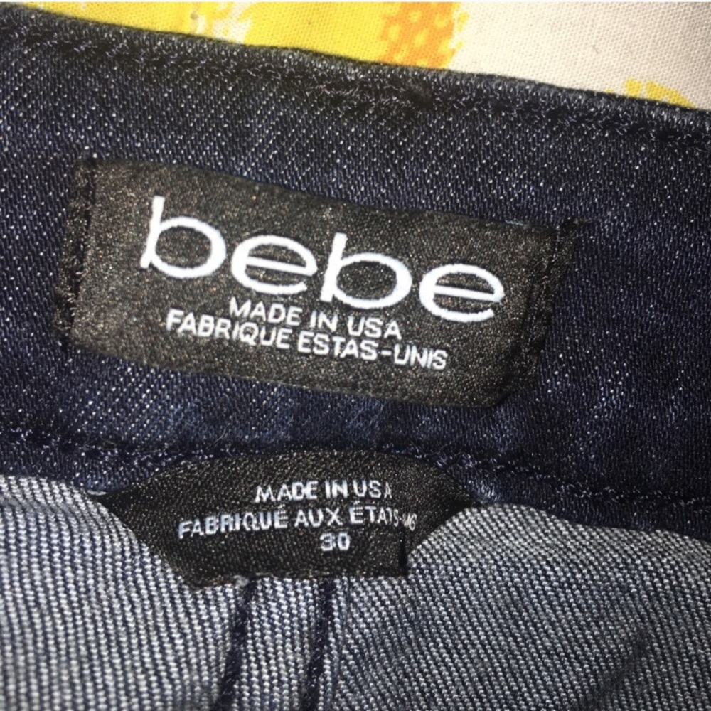 Identical pairs of Bebe size 30 skinny jeans
