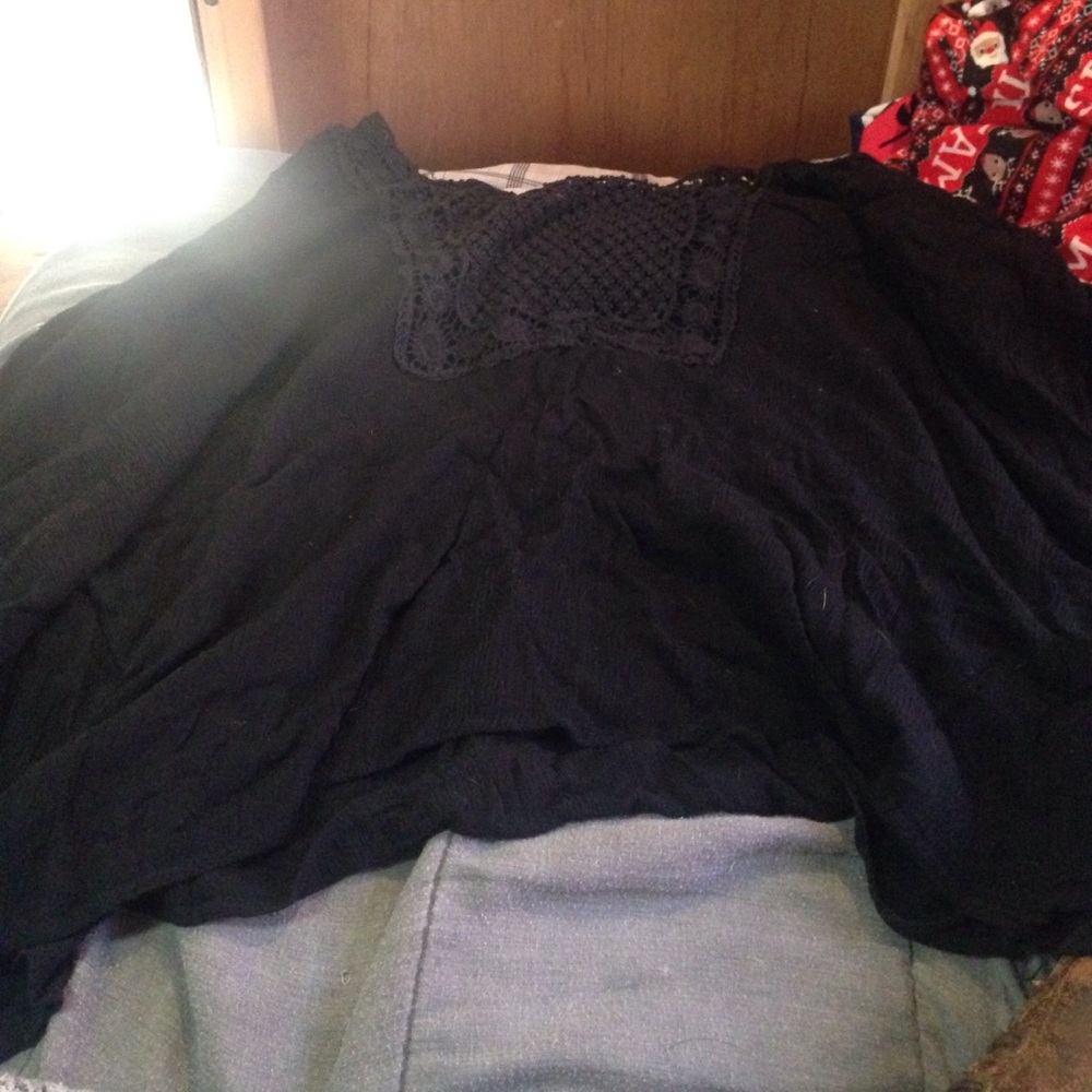 Black crop top with lace/netting in front