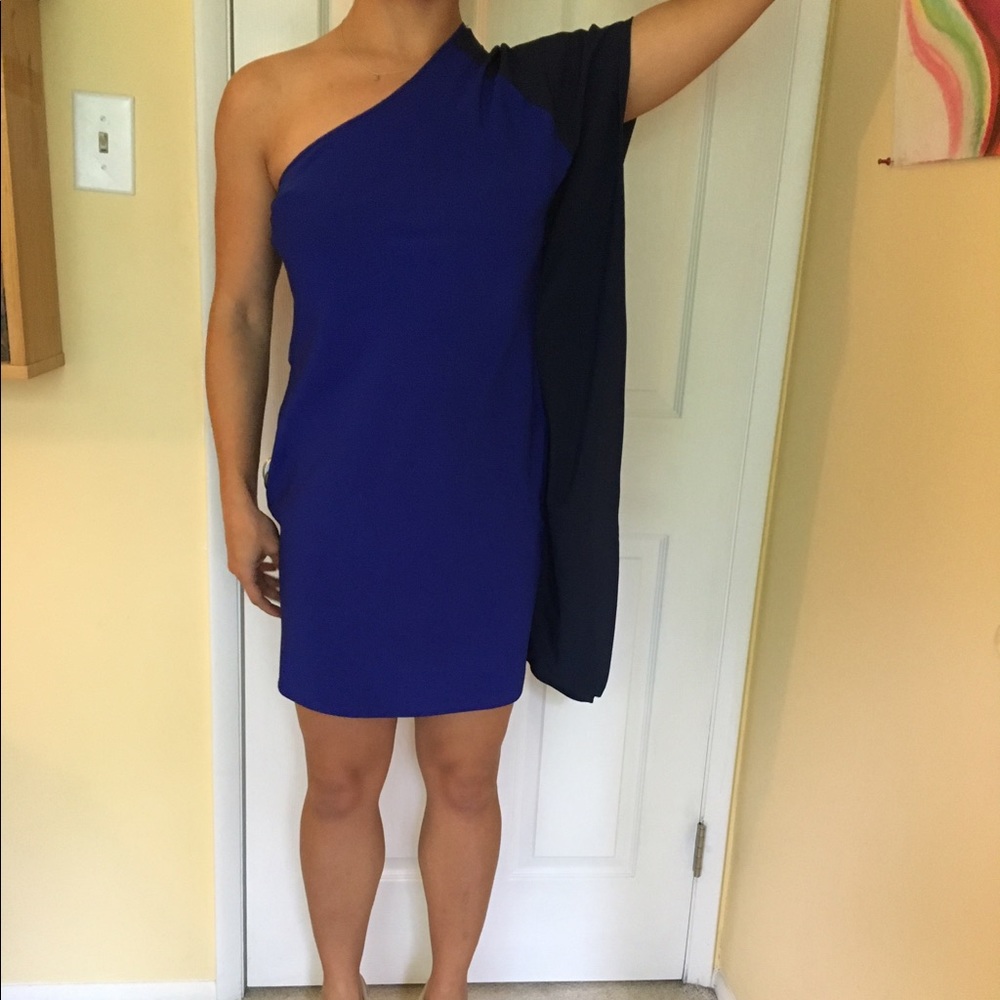 Blue and black one shoulder with wing!