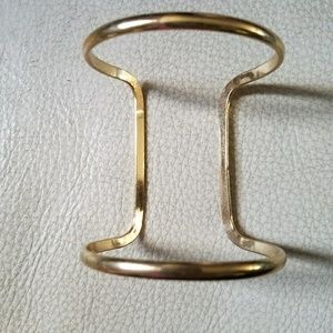Gold bases open cuff bracelet.  2.25" wide.