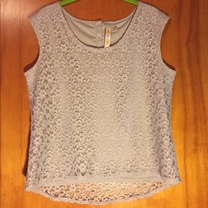 Sleeveless blouse with lace overlay