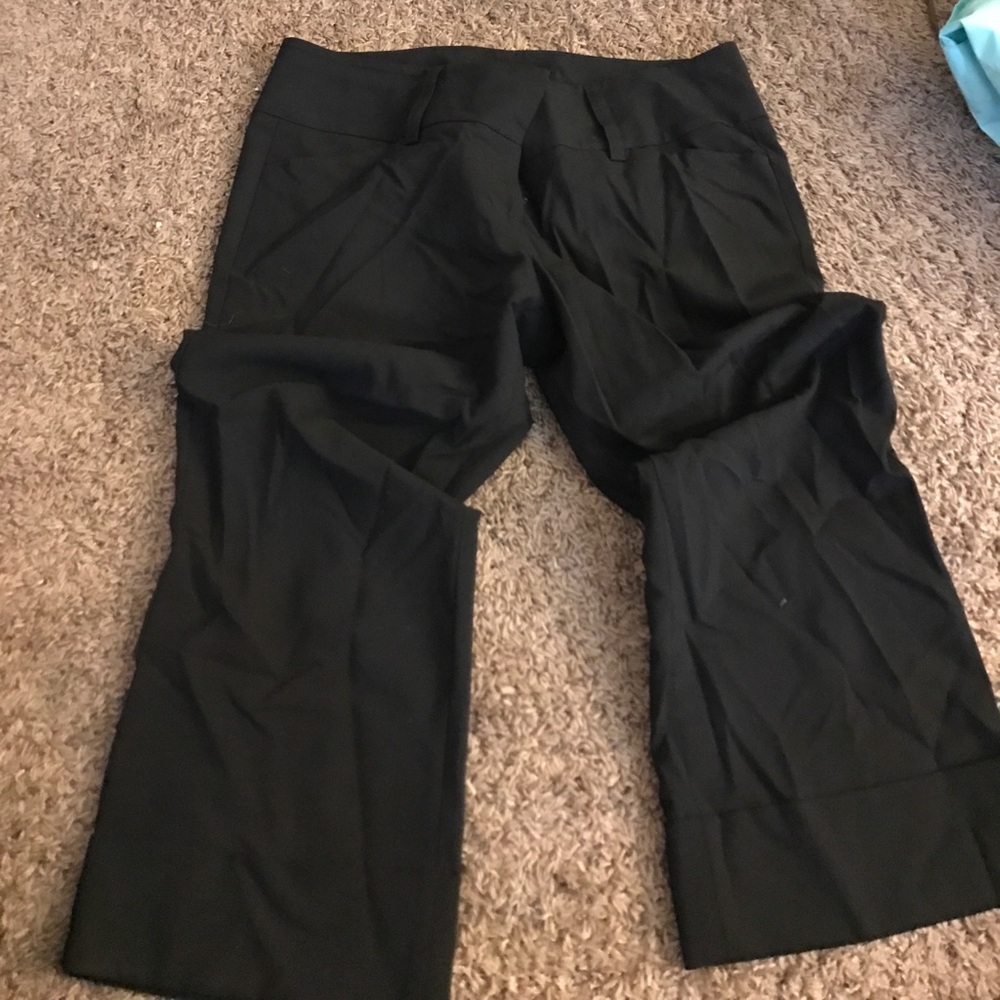 Cuffed Capri slacks.