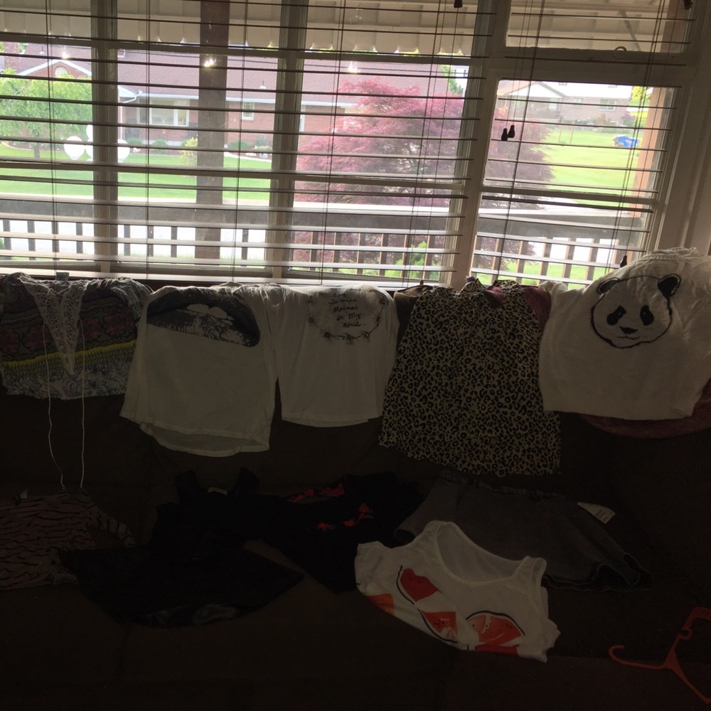 a lot of random shirts & a black denim skirt!