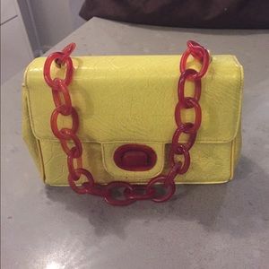 Vintage yellow purse with red lucite handle