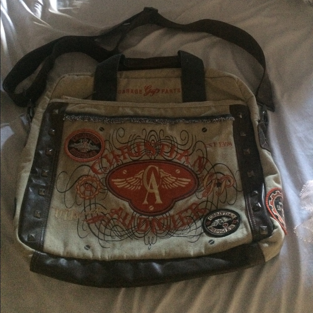 Men's sided backpack by Christian audigier