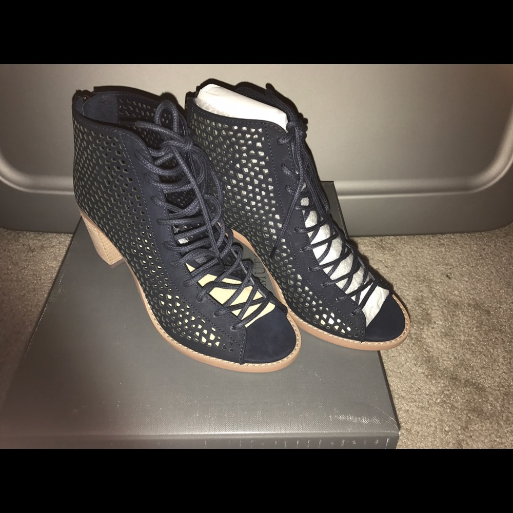 Vince Camuto lace up Booties. NWT.