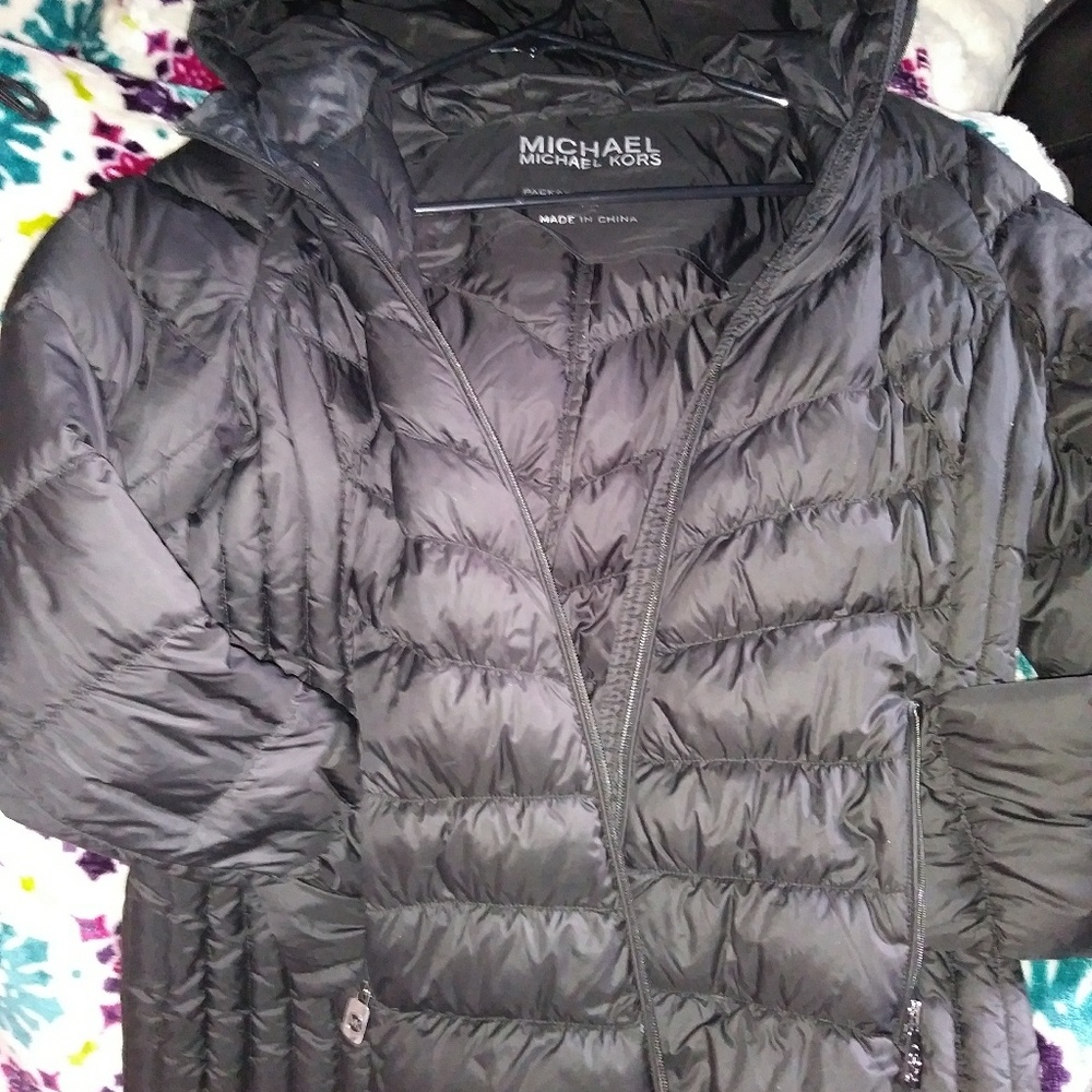 Black thin but warm water proofed down jacket
