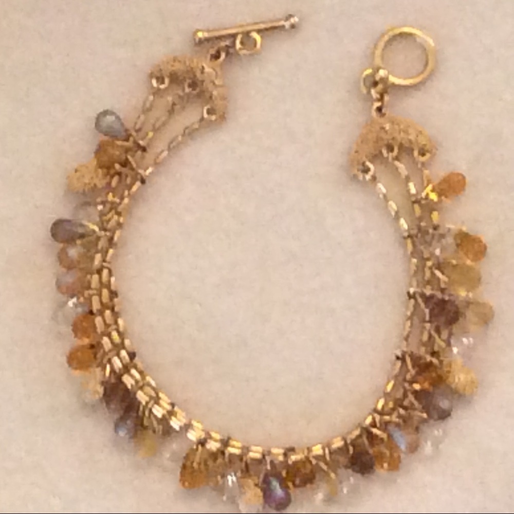 Carolee gold tone bracelet w/pretty stone dangles