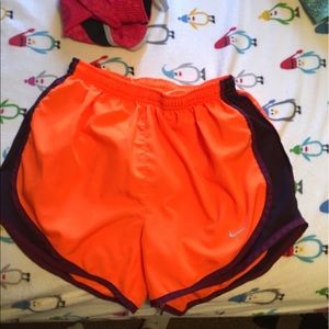 Nike neon orange running shorts. Size xsmall