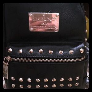 Brand new black leather and gold studded backpack