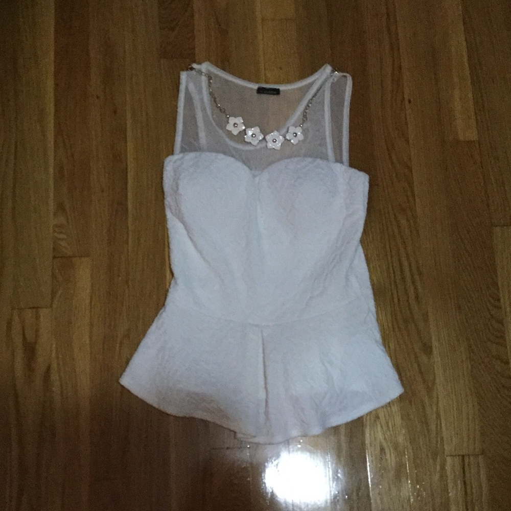 White peplum top with a built in necklace