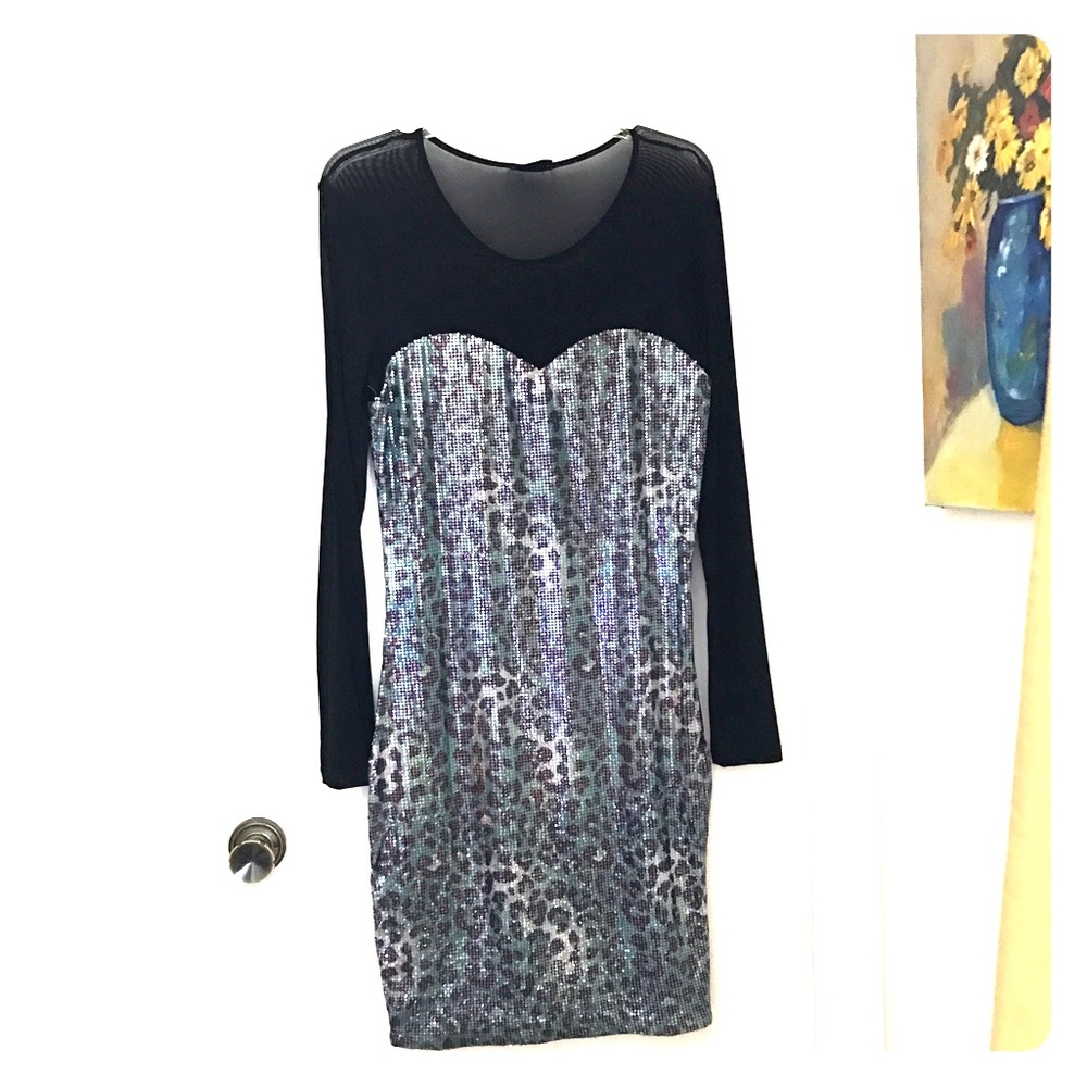 Cocktail dress with sequins and sheer top