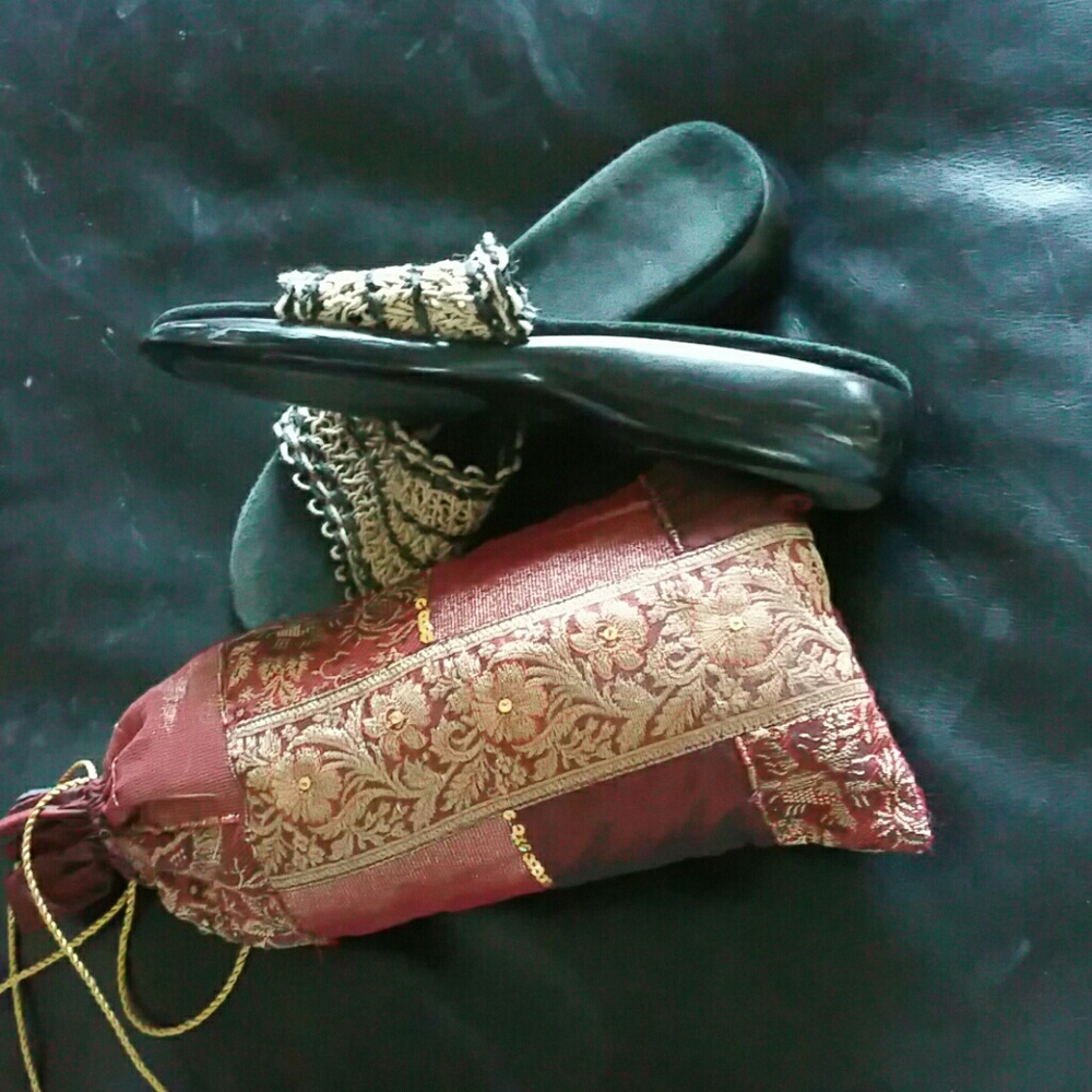 Very Attractive Black and Tan Sandals