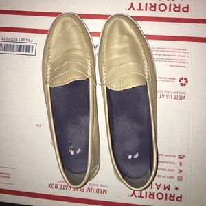 Cole Haan Nantucket Gold leather loafers.