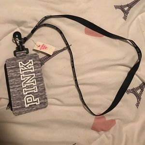 Pink wallet with lanyard