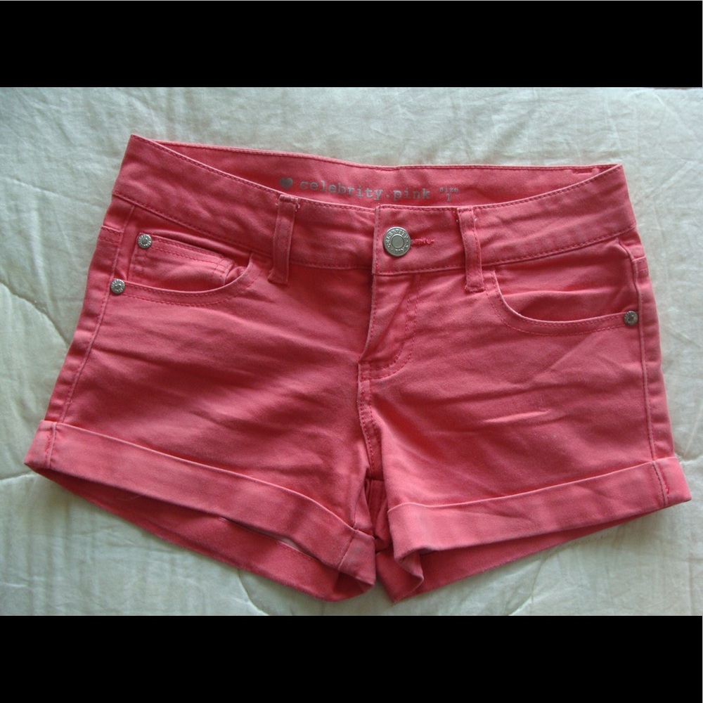 Pink stretchy mid rise shorts