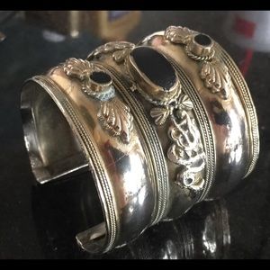 Silver toned cuff bracelet with black detail