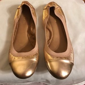 Authentic Size 6 gold COACH flats; worn 4x at most