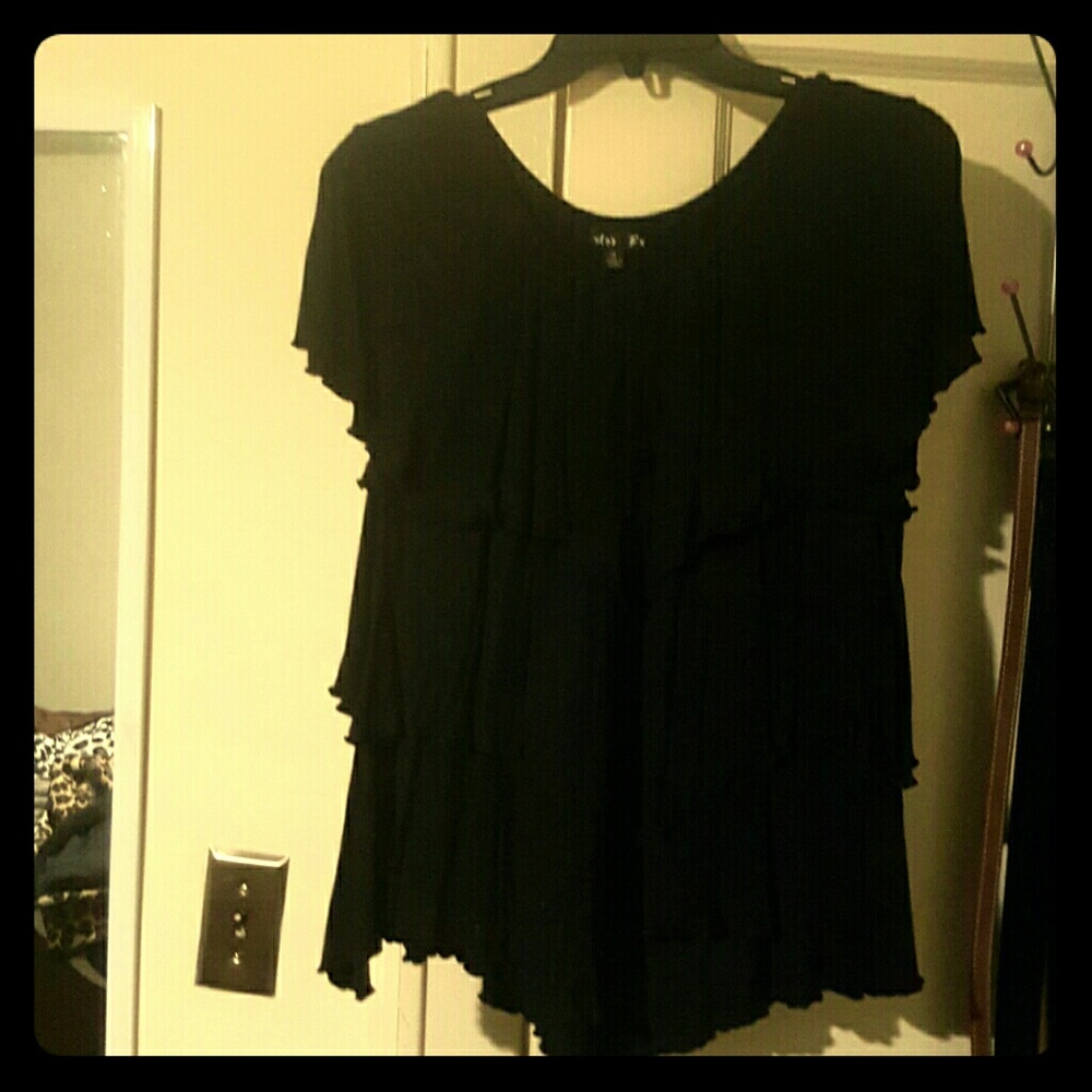 A ruffled black shirt