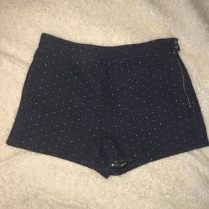 Side zipped navy polka dot shorts