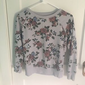 Gently used floral sweater.