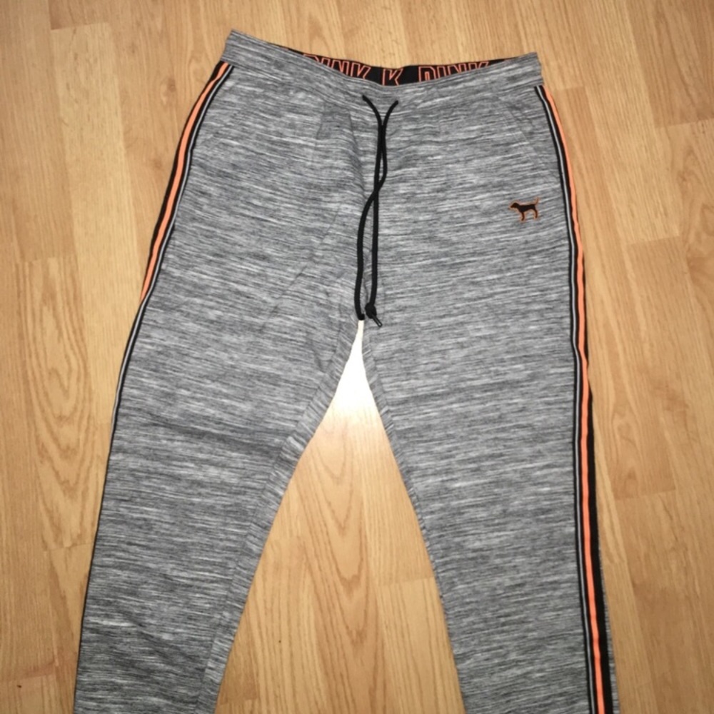 PINK black and orange sweatpants