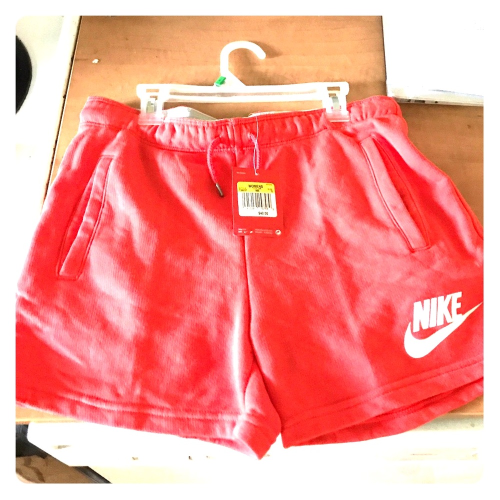 NWT Nike shorts. Sweats material. Red orange.