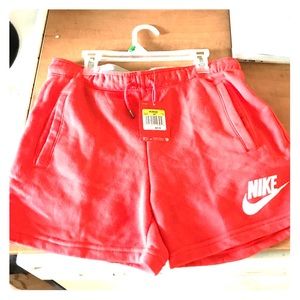 NWT Nike shorts. Sweats material. Red orange.