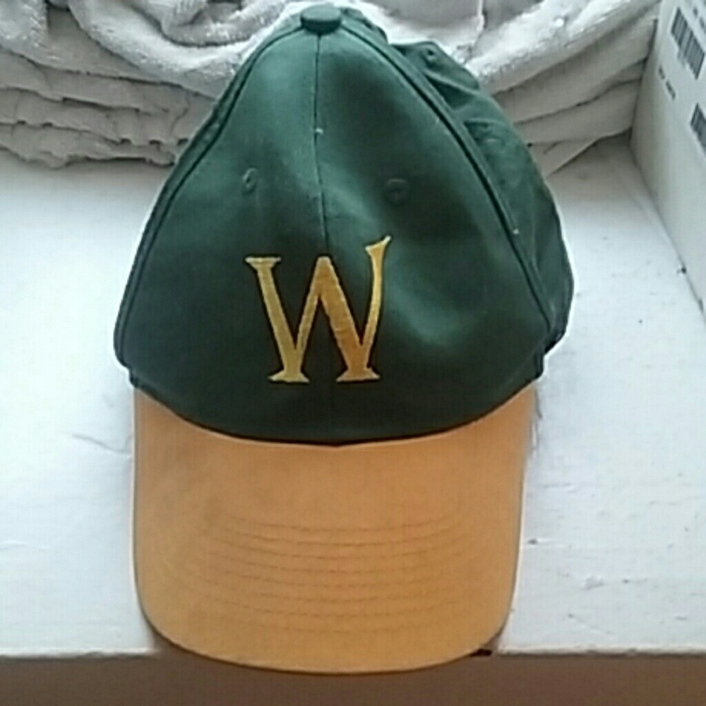 Baseball cap with yellow "W" for "Win"