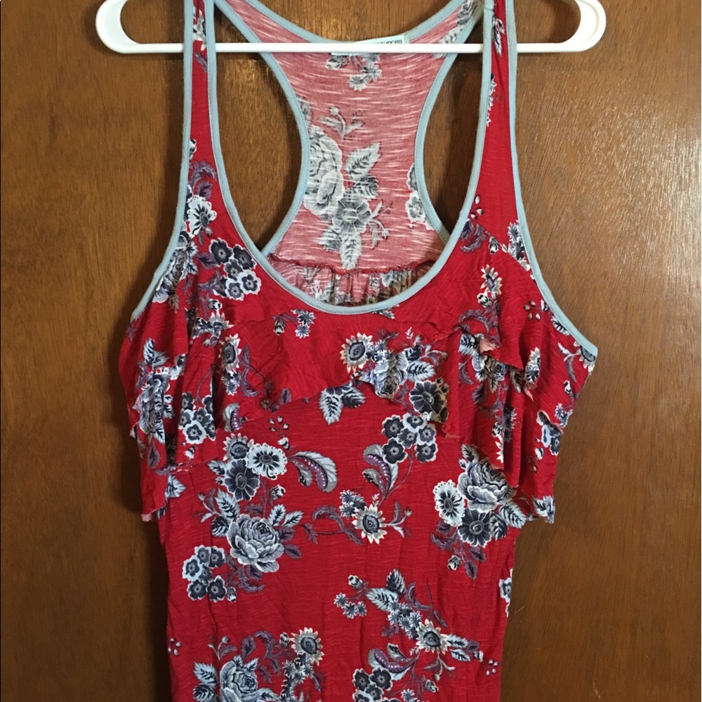 Racer-back tank with ruffles.