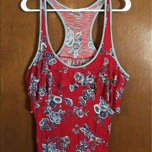 Racer-back tank with ruffles.