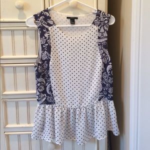 Peplum sleeveless blouse