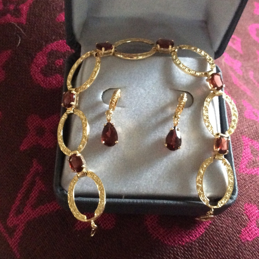 Garnet earrings with matching bracelet.