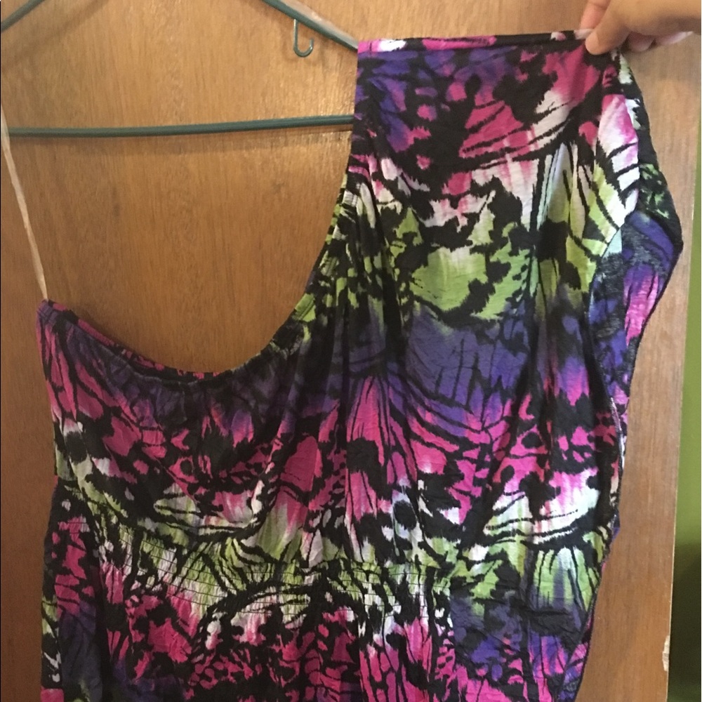 Off the shoulder, multi-color shirt.