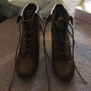 Brown heeled booties size 7.5