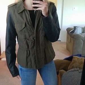 Army green jacket with leather sleeves