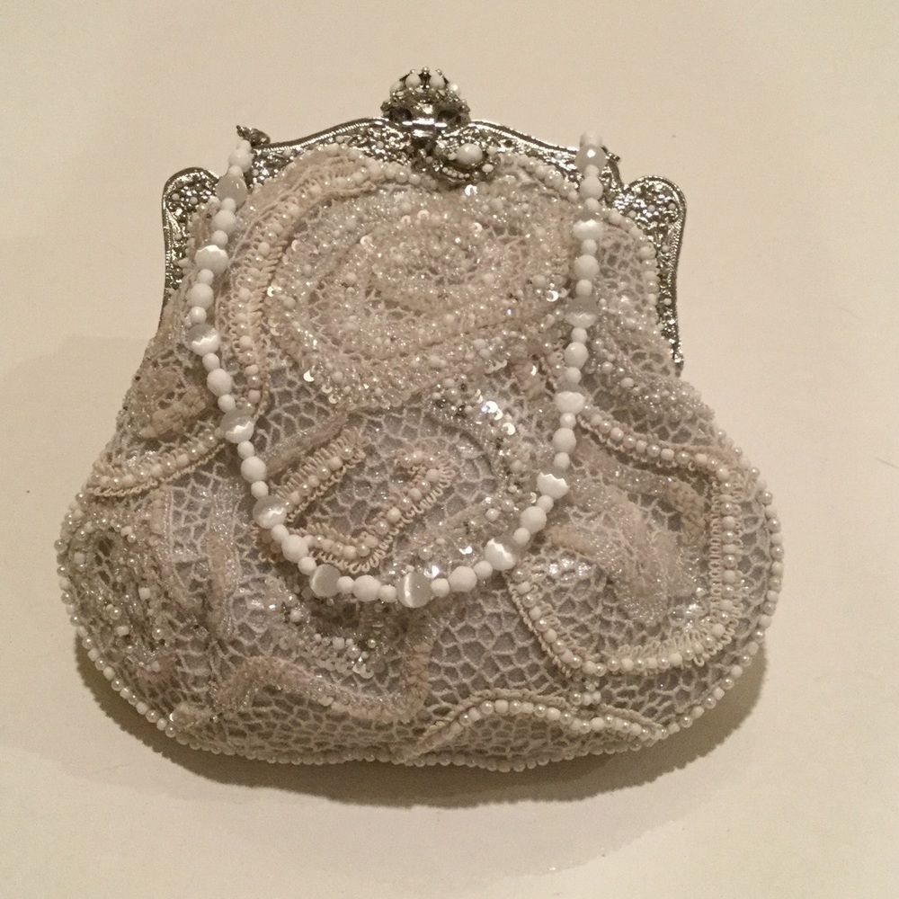 Larissa Barrera white beaded bag with stone handle