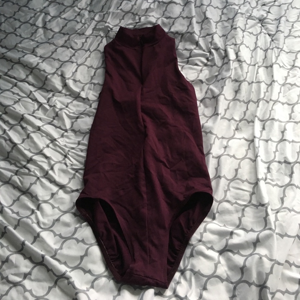 Dark purple high neck leotard and matching skirt