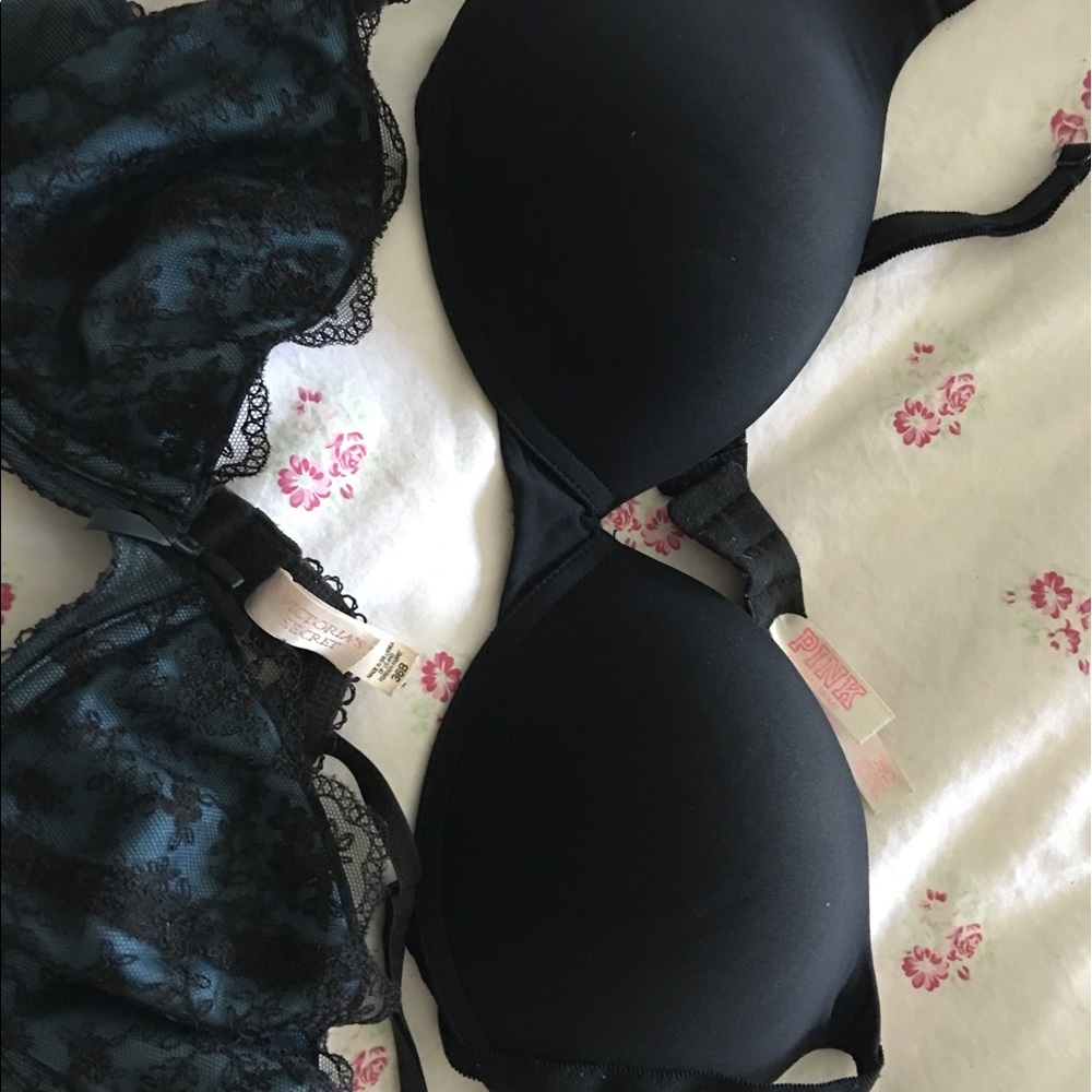 Two Victoria secret bras and a bathing suit bottom